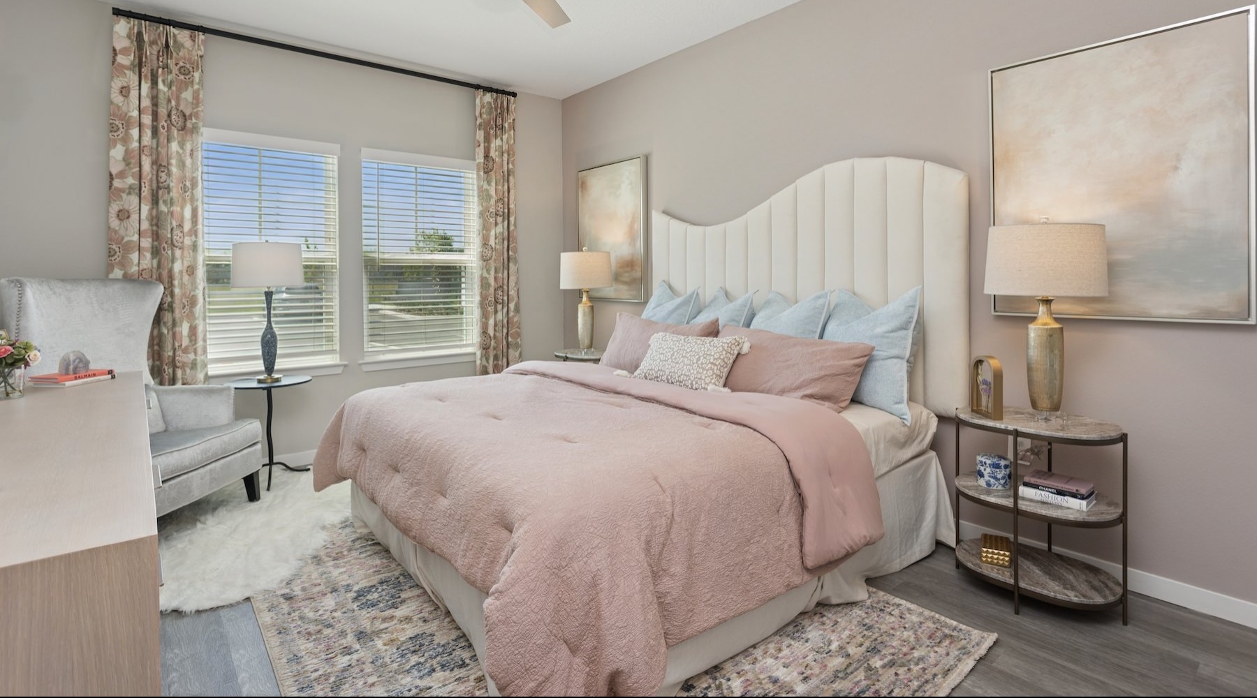 a bedroom with a bed and two nightstands