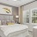 a bedroom with a bed and a lamp