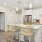 a kitchen with white cabinets