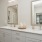 a bathroom with a large mirror